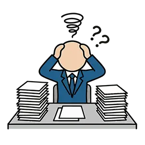 机に山積みになった書類の前で、仕事の多さに頭を抱えて混乱している男性のイラスト